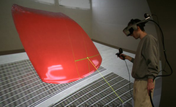 The end result of using the system to spray paint a car hood. Both directionally diffuse and gloss layers have been applied. In this case, a photorealistic image of how the paint would look when dry is displayed to the user. Useful information such as overspray, and percentage covererage is given to the user. This makes the system ideal for training, as both visual and numeric feedback is given to the trainee.